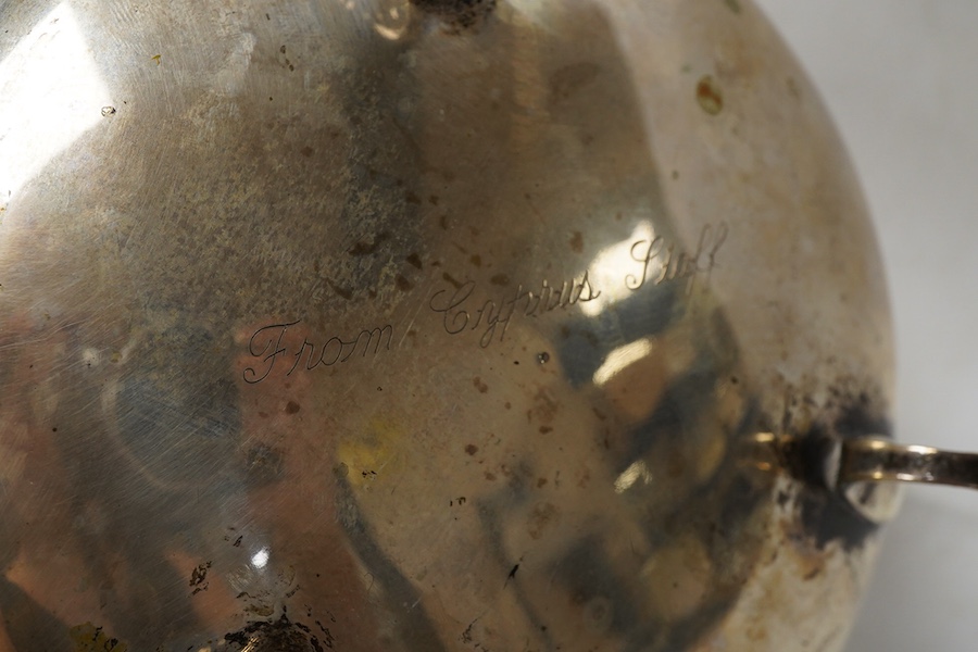 A continental circular white metal bowl with engraved fruiting vine decoration, diameter 19.8cm, 14oz.